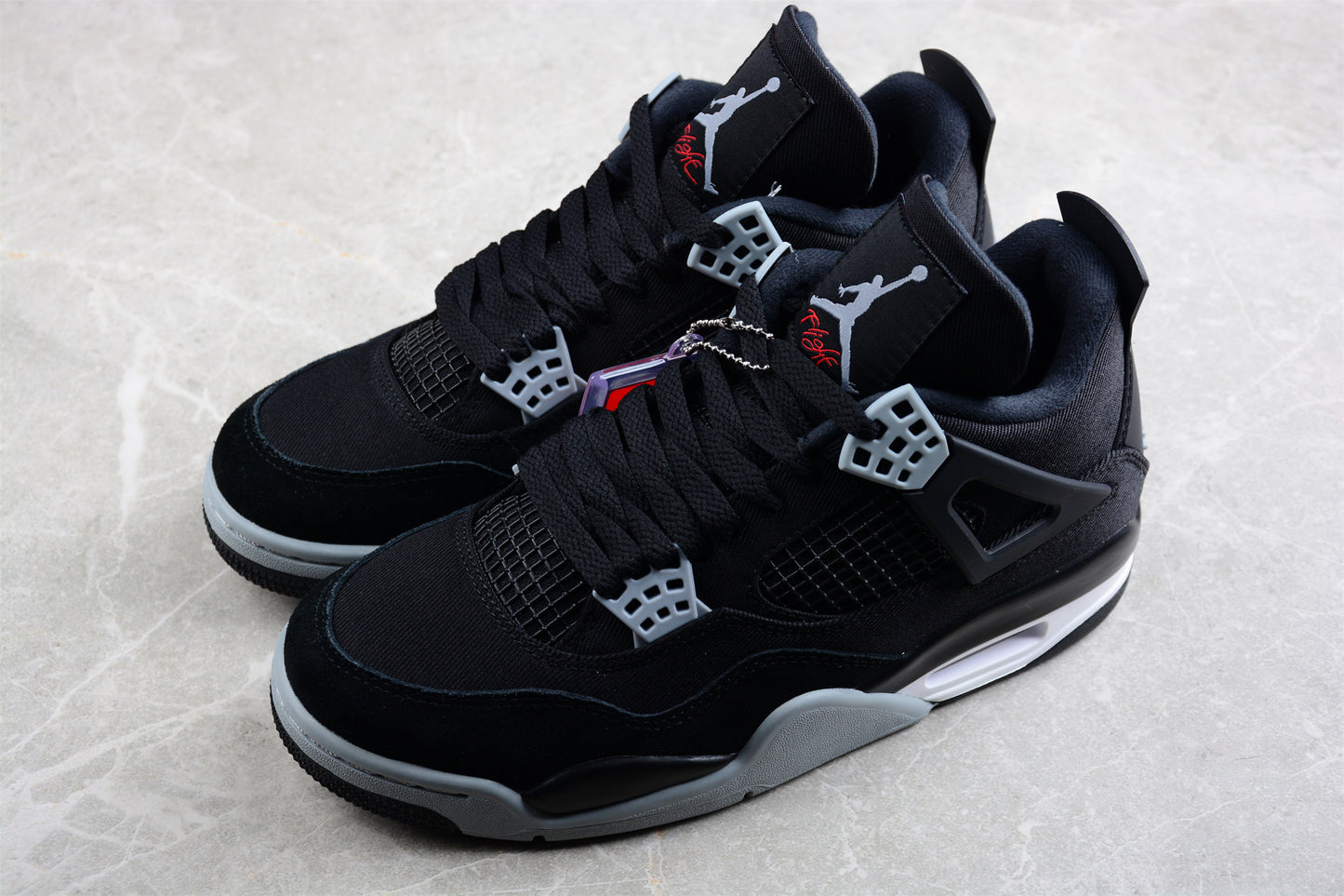 Air Jordan 4 Retro "Black Canvas"