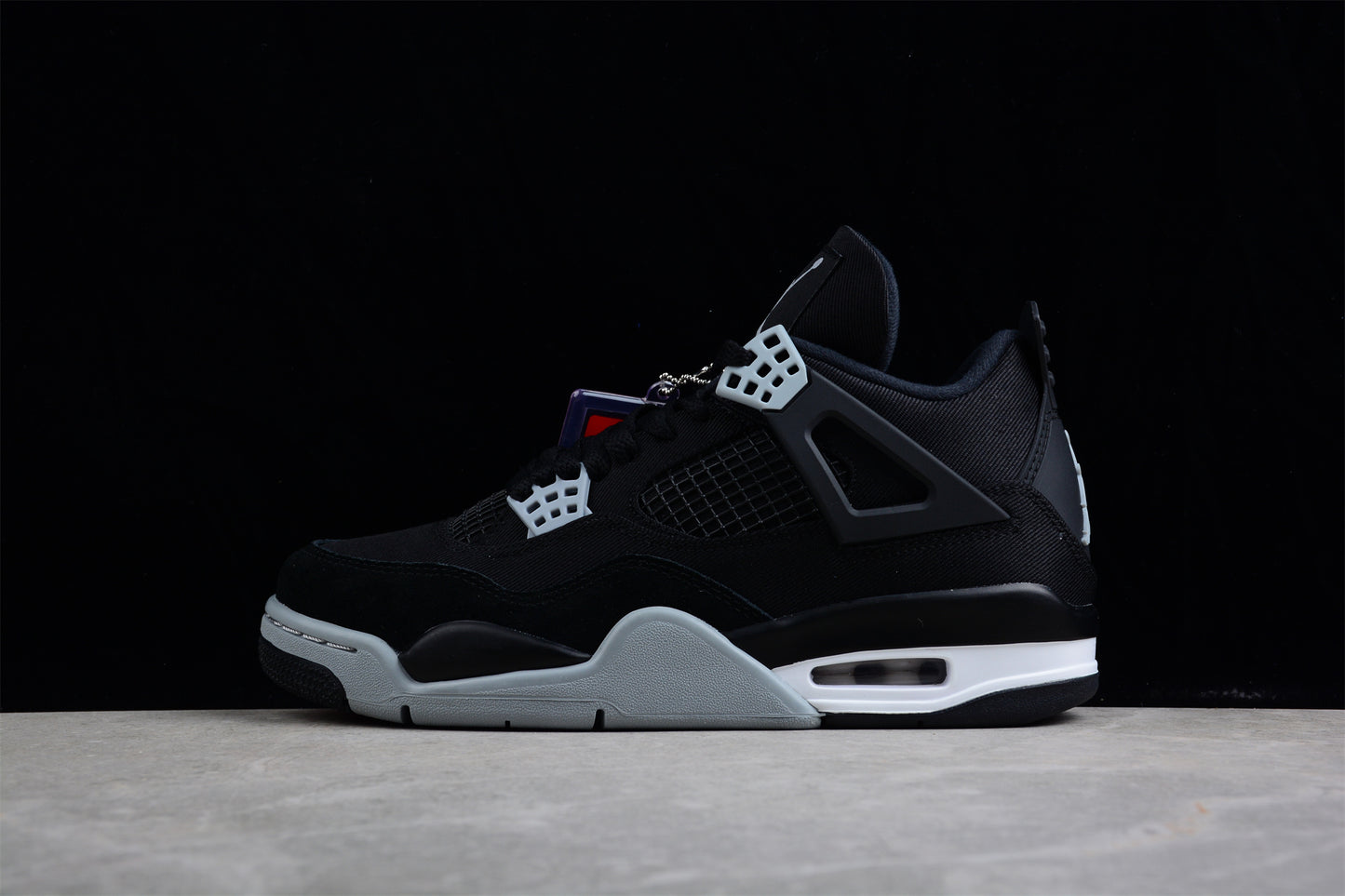 Air Jordan 4 Retro "Black Canvas"