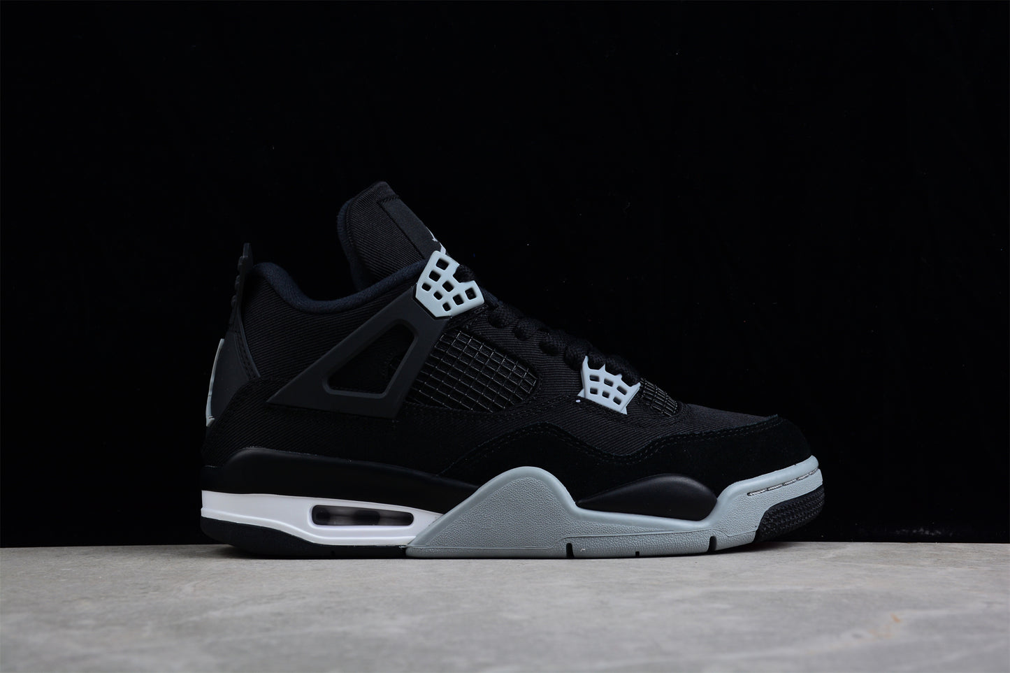 Air Jordan 4 Retro "Black Canvas"